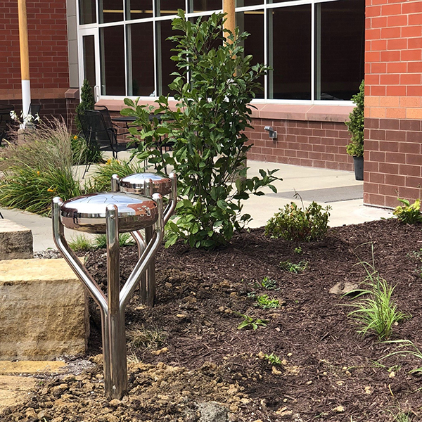 University Students help create Music Garden at Women’s Prison, Mitchellville, Iowa