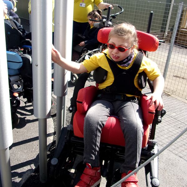 Special Needs School Use Outdoor Musical Instruments For OT And Playtime, Isle Of Wight, UK