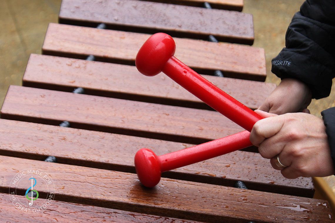 Close Up Hands and Beaters of Outdoor Akadinda 